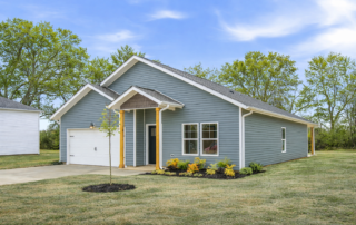 AspenExteriorEnhanced Aspen floor plan by Maplewood Homes featuring a single-story exterior, covered entry, landscaped front yard, and modern curb appeal
