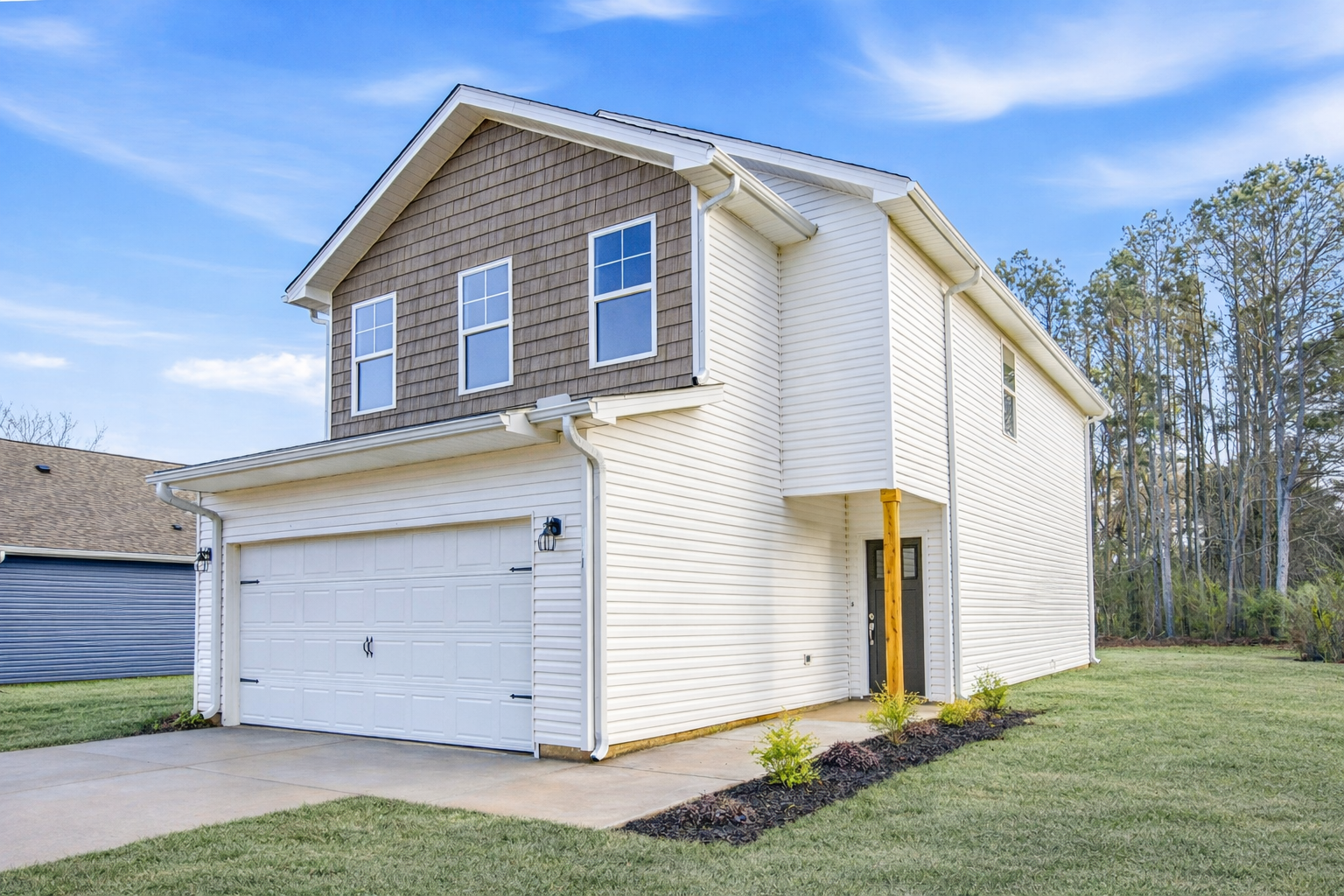 Birchexterior2 The Birch floor plan by Maplewood Homes two-story exterior with covered front entry and side yard