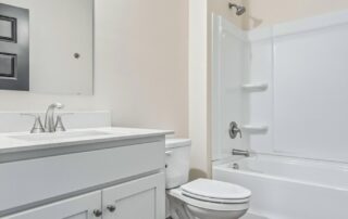 Tercel-22 Aspen floor plan hall bathroom by Maplewood Homes with vanity and tub shower combination